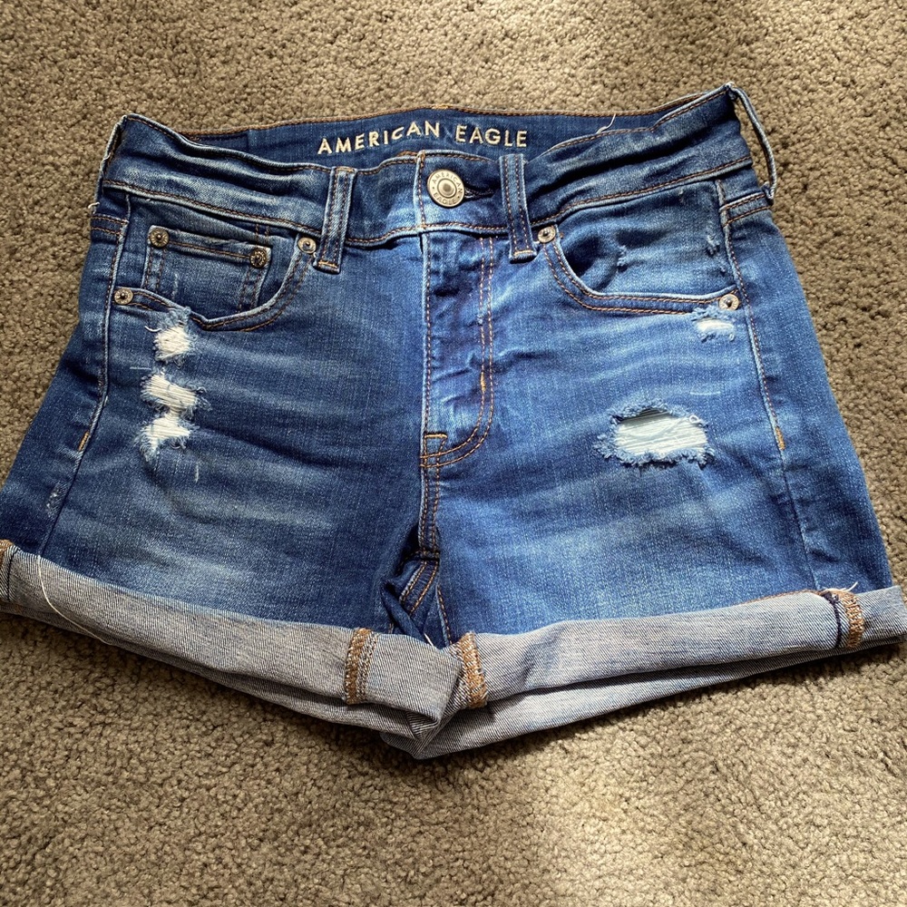 High rise, blue American eagle shorts.